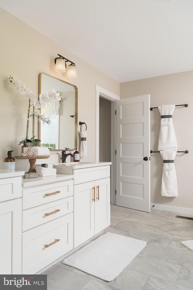 bathroom featuring vanity