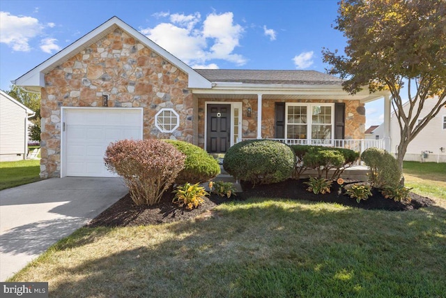 view of front facade featuring a front yard, an attached garage, a porch, stone siding, and concrete driveway
