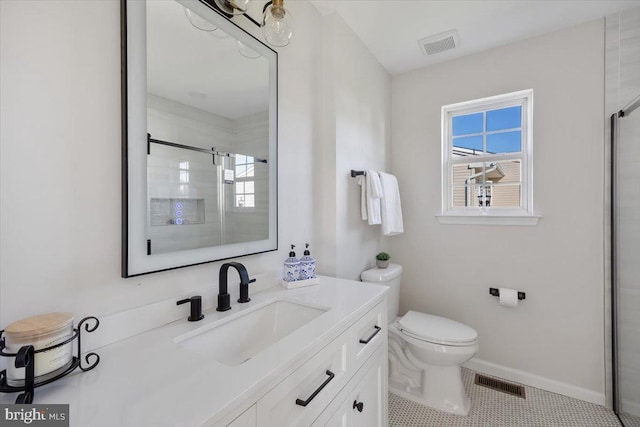 bathroom featuring walk in shower, tile patterned floors, vanity, and toilet