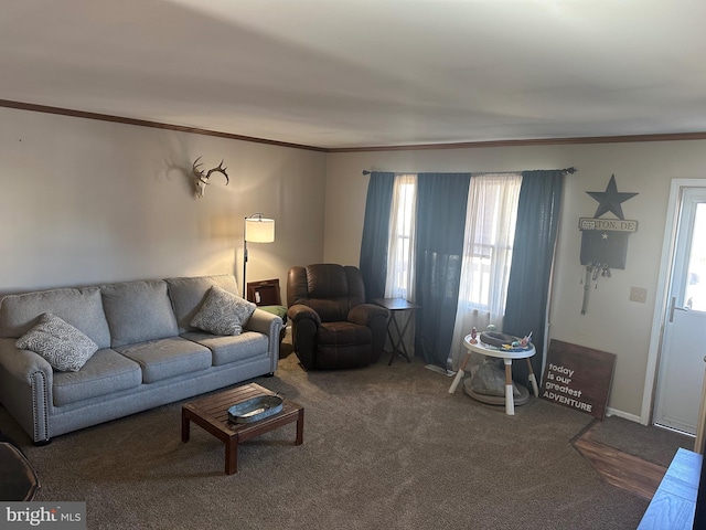 carpeted living room with ornamental molding and plenty of natural light