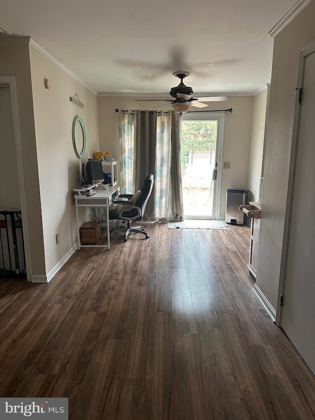 office with dark wood-type flooring, ceiling fan, and ornamental molding