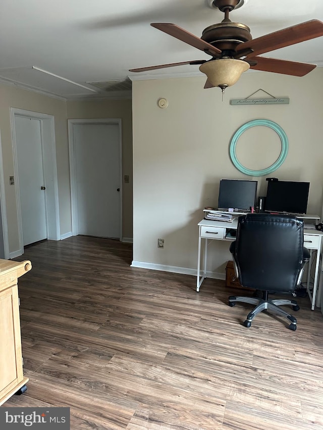 home office featuring ceiling fan, wood-type flooring, and crown molding