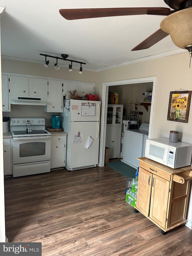 kitchen with white appliances, washer and dryer, and crown molding