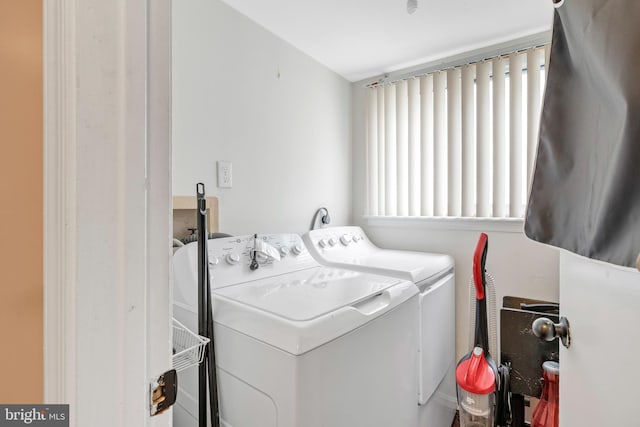 laundry area featuring washer and clothes dryer