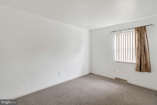 empty room with carpet floors