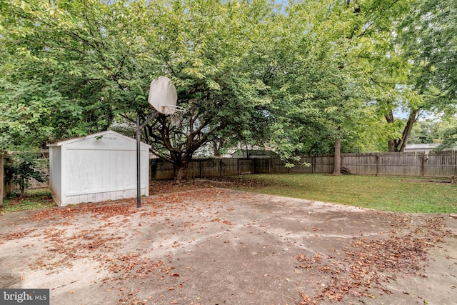 view of patio with a storage unit