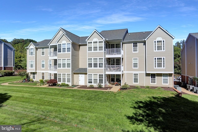 view of property featuring central air condition unit