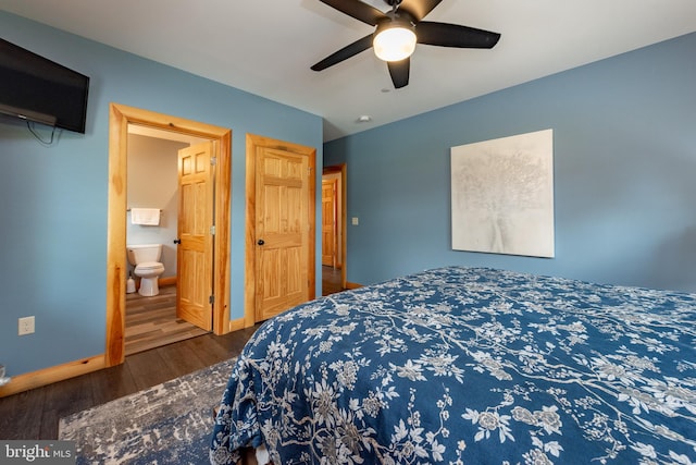 bedroom with ensuite bath, ceiling fan, and dark wood-type flooring