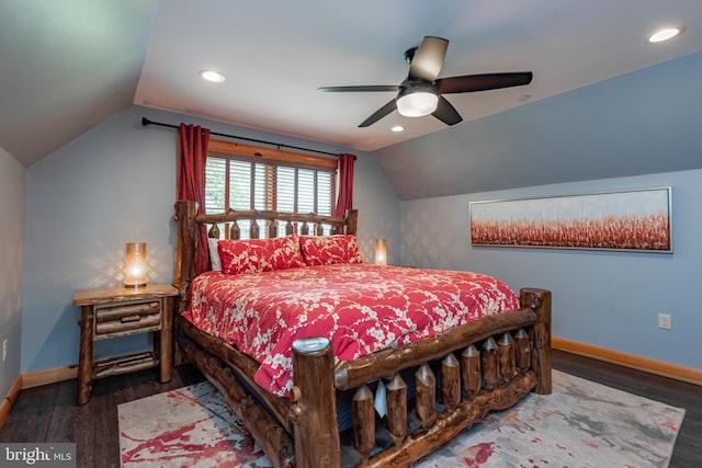 bedroom with hardwood / wood-style floors, vaulted ceiling, and ceiling fan