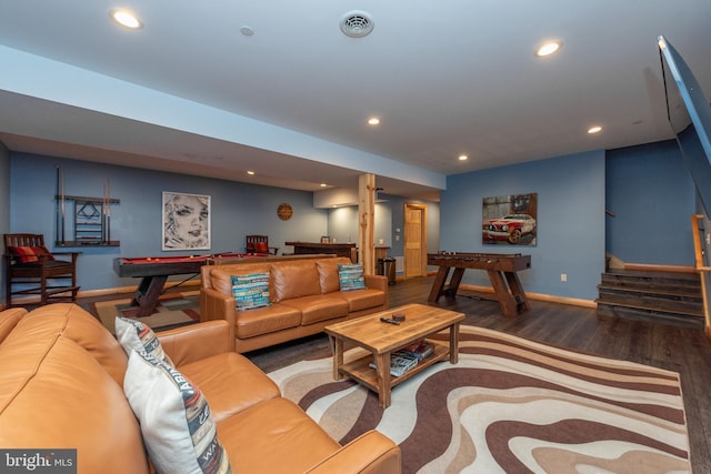 living room featuring dark hardwood / wood-style floors and billiards