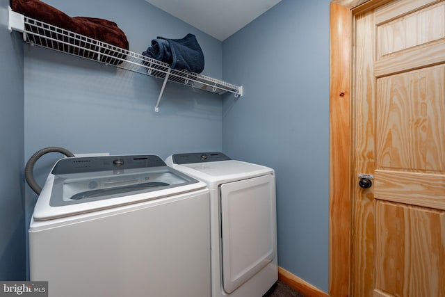 laundry room featuring washer and clothes dryer