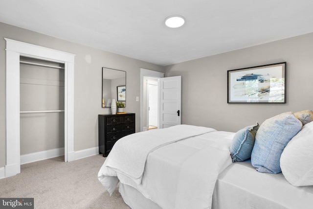 bedroom with light colored carpet