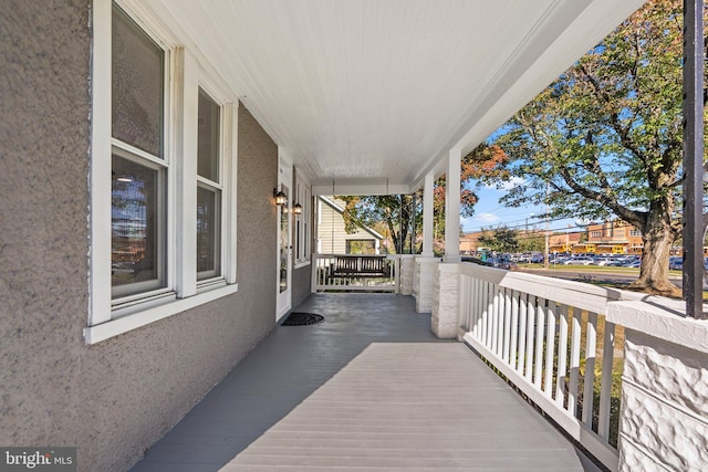 wooden terrace with covered porch