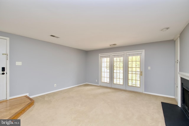 living room featuring light colored carpet