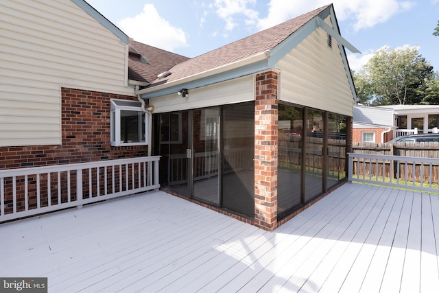 deck featuring a sunroom