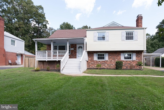 tri-level home featuring a front yard