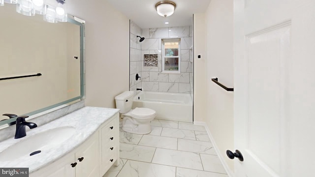 full bathroom featuring vanity, tiled shower / bath combo, and toilet