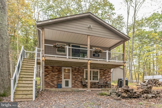 rear view of house featuring a patio area