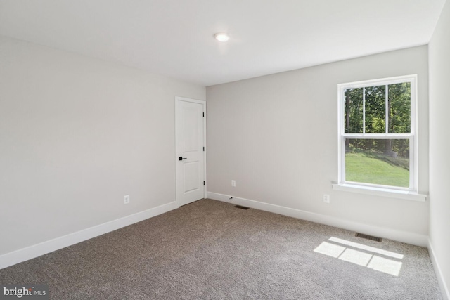 view of carpeted spare room