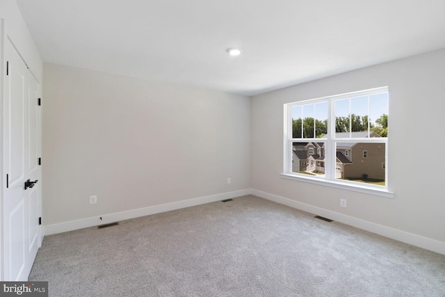 view of carpeted spare room