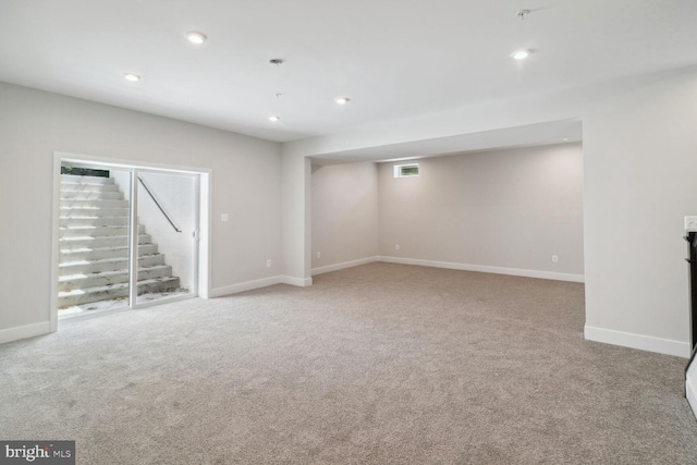 basement with light colored carpet