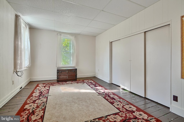 bedroom featuring a closet and hardwood / wood-style floors