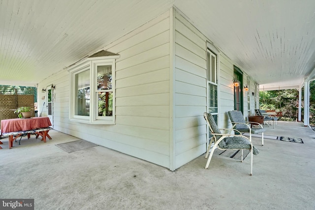 view of patio featuring a porch