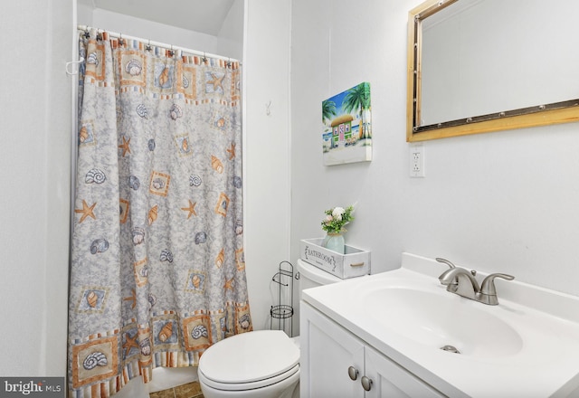 bathroom with vanity, toilet, and a shower with curtain