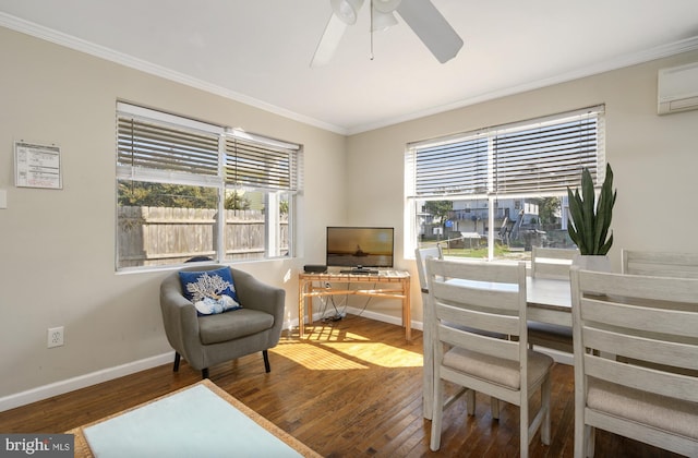 office space with wood-type flooring, a wall unit AC, ornamental molding, and ceiling fan