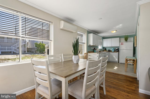 dining area with dark wood-type flooring, an AC wall unit, and a healthy amount of sunlight