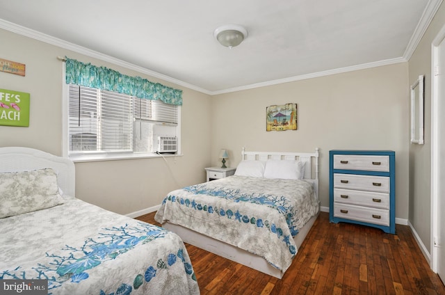 bedroom with crown molding and dark hardwood / wood-style floors