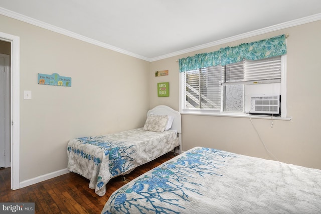 bedroom with cooling unit, ornamental molding, and dark wood-type flooring