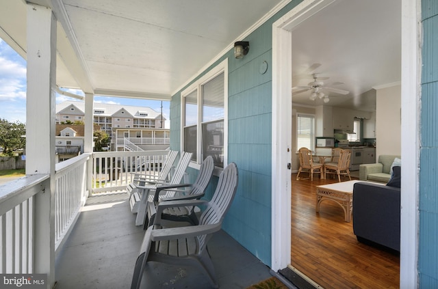 balcony featuring ceiling fan