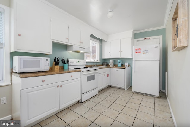 kitchen featuring white appliances, ornamental molding, and white cabinetry