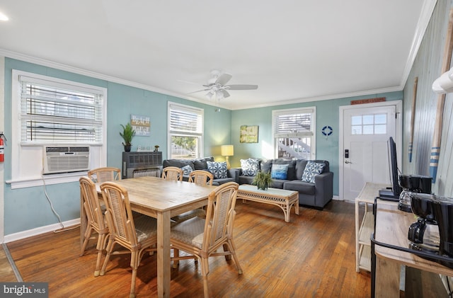 dining area with ceiling fan, ornamental molding, cooling unit, and dark wood-type flooring