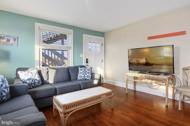 living room featuring dark hardwood / wood-style flooring