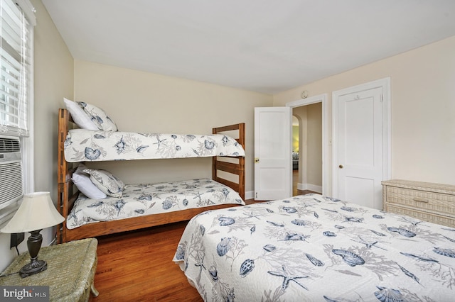 bedroom featuring hardwood / wood-style floors