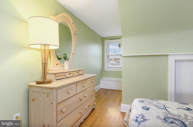 bedroom featuring light wood-type flooring