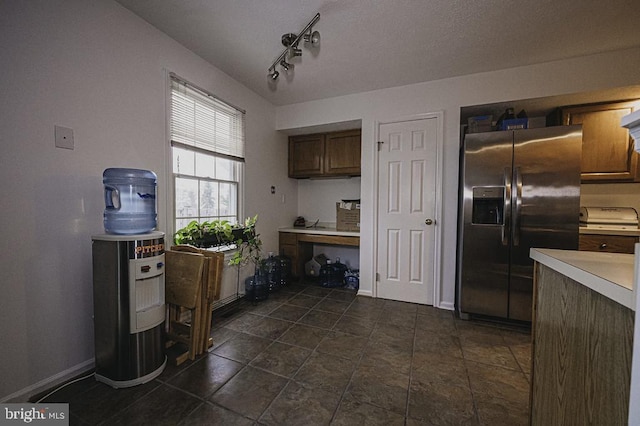 kitchen with stainless steel fridge