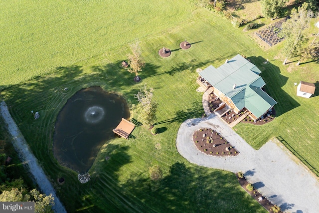 birds eye view of property featuring a rural view