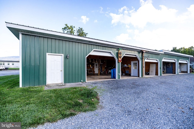 garage featuring a yard