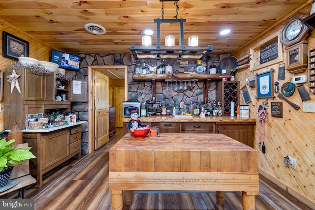 kitchen with butcher block countertops, wood walls, wood ceiling, and dark hardwood / wood-style floors