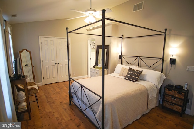 608 Cloverfields Dr, Stevensville, MD 21666 - bedroom with wood finished floors, vaulted ceiling, a closet, baseboards, and ceiling fan