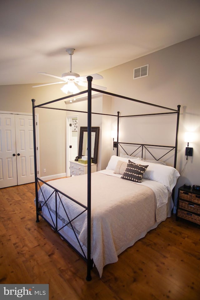 bedroom featuring ceiling fan and dark hardwood / wood-style floors