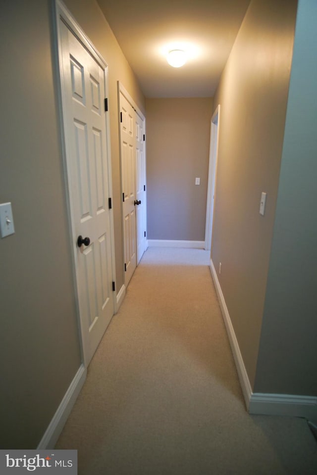 608 Cloverfields Dr, Stevensville, MD 21666 - hall with baseboards and light carpet