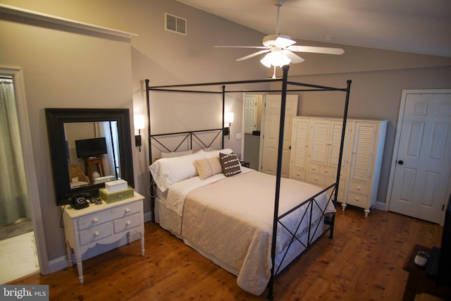 bedroom featuring lofted ceiling, dark hardwood / wood-style floors, and ceiling fan