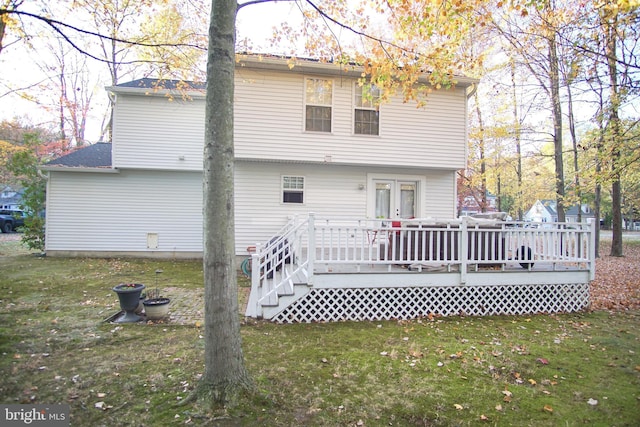 608 Cloverfields Dr, Stevensville, MD 21666 - rear view of house featuring a yard and a deck