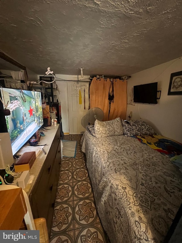 bedroom with a textured ceiling