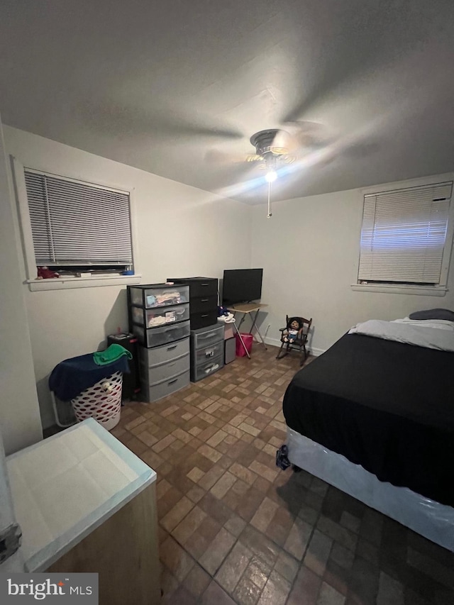 bedroom featuring ceiling fan