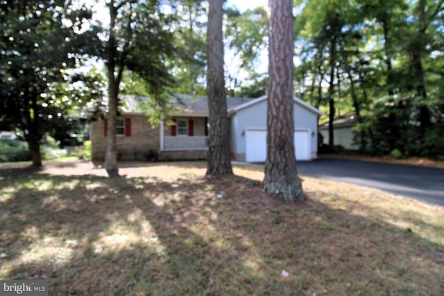 single story home with a garage